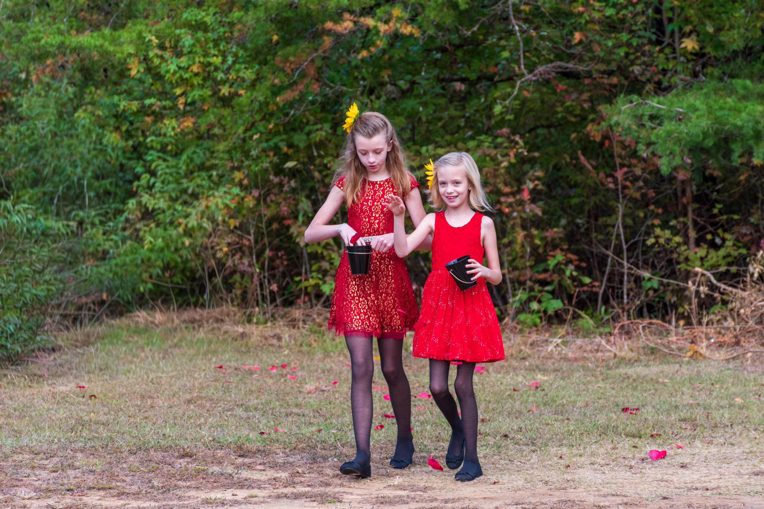 2 Children in Red Dresses as Flower Girls