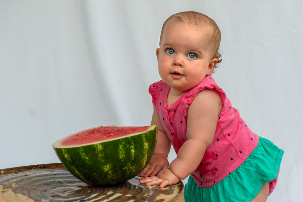 Blue Eyed Toddler With Watermelon