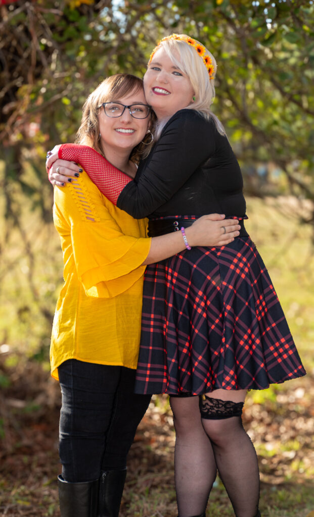 Bride Hugging Family Member Outside