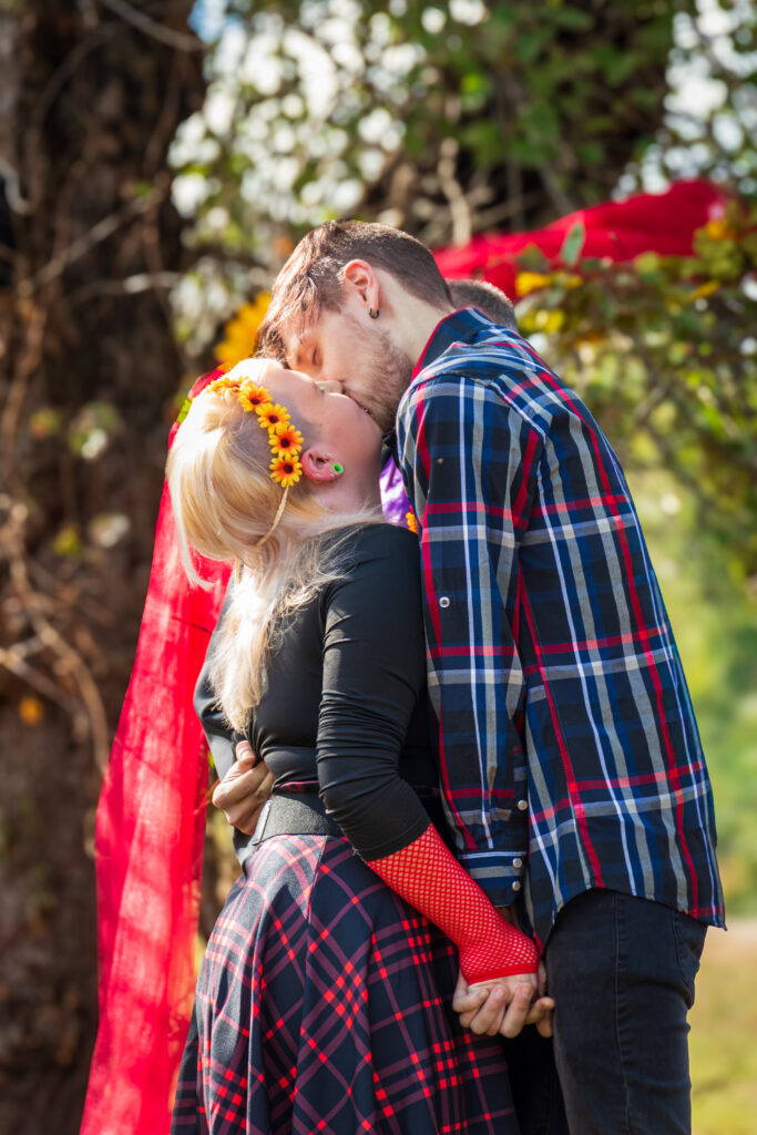 Coouple Kissing on Their Wedding Day