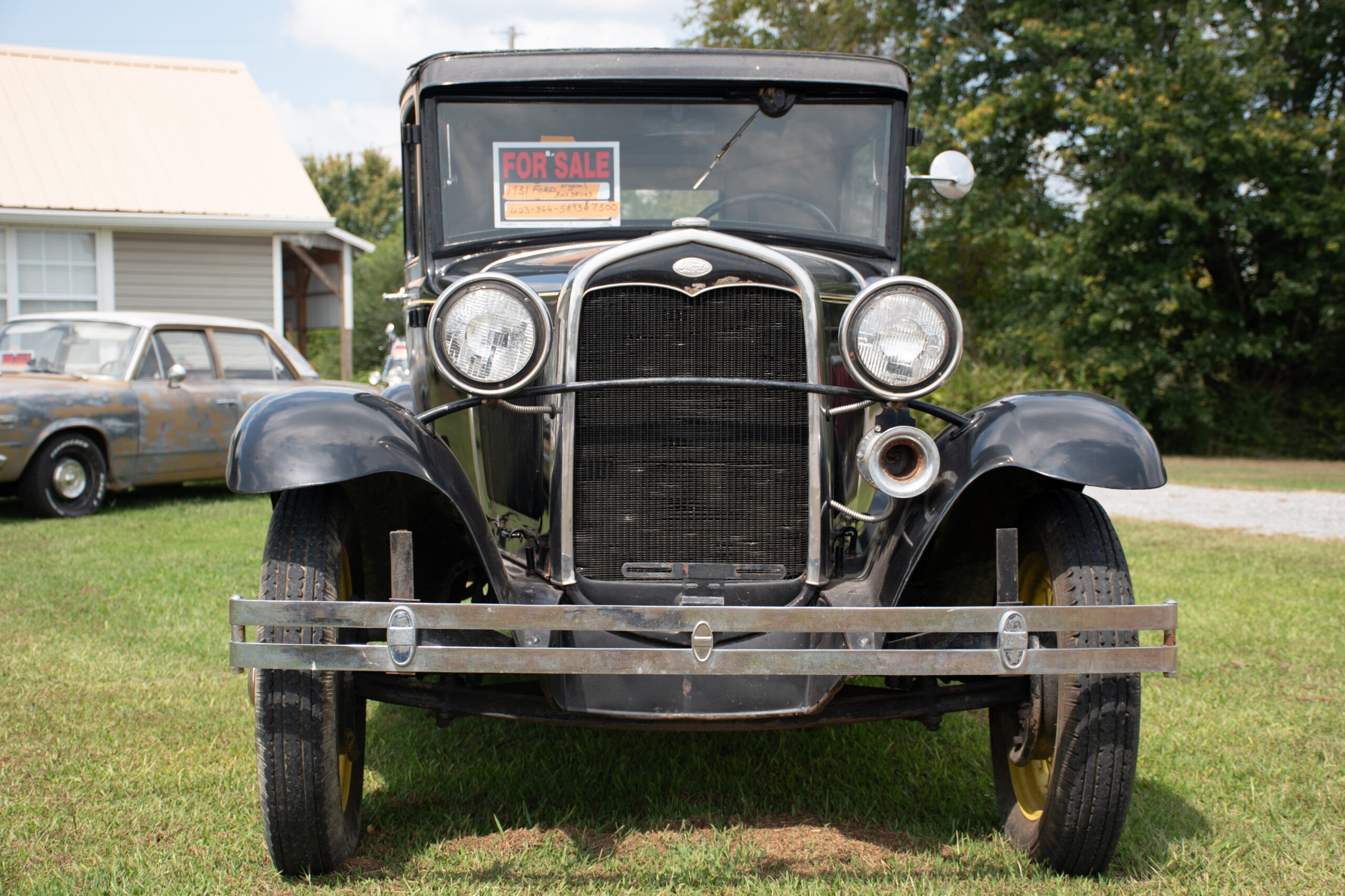 Classic car photography subject — front view of a Model A Ford found on a rural Tennessee highway.