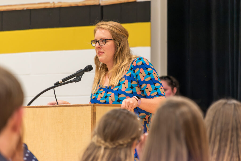 Woman at Speaking Podium