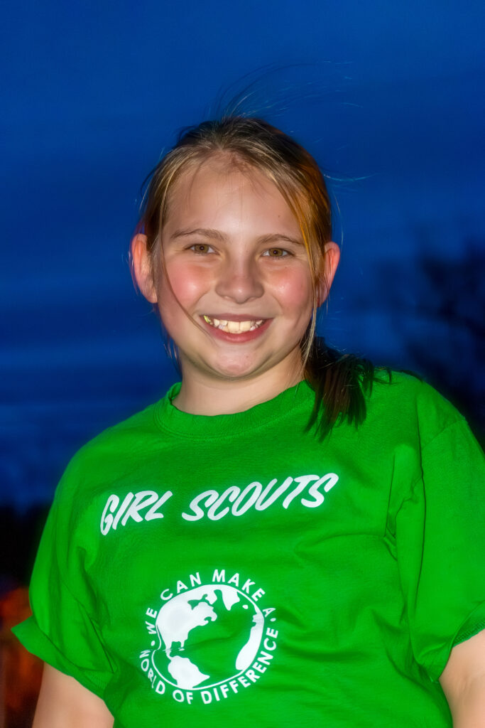 Young Girl in Girlscouts Shirt After Sunset